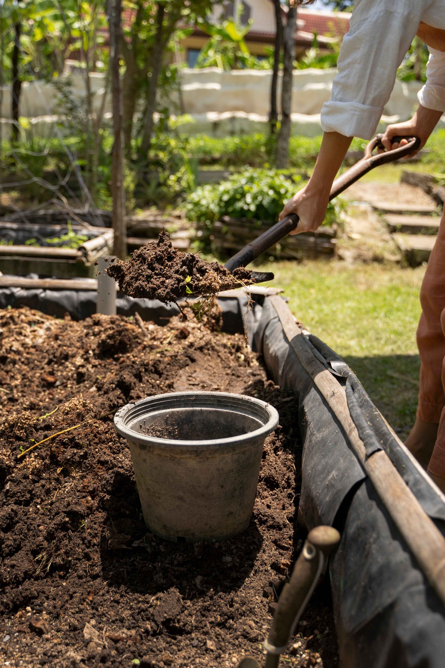 side-view-woman-holding-shovel_11zon